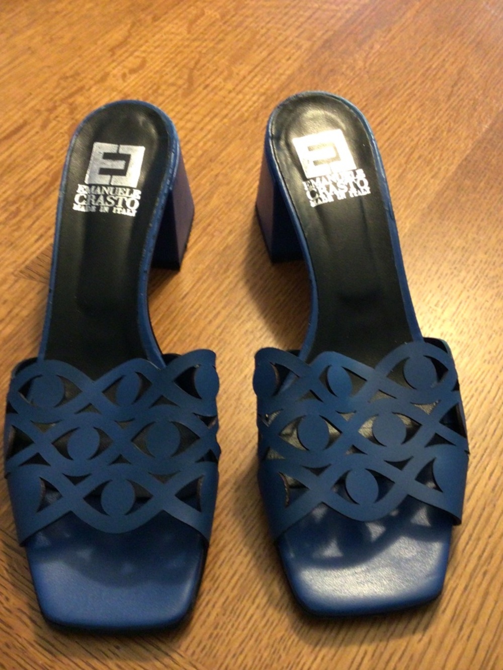 Italian Leather heeled slide with laser cuts in cobalt blue.  Emanuele Castro.